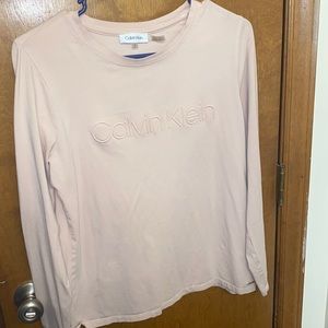 This is Calvin Klein Small Pink Shirt!